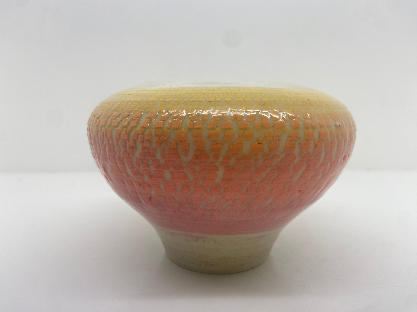 Sunset inspired heart shaped frangipani candle