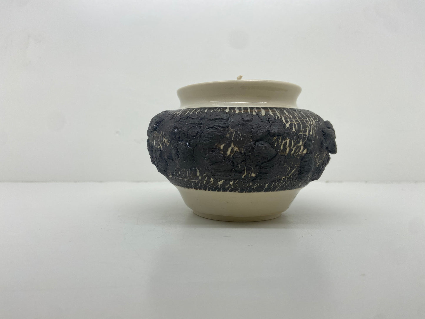 Tree-bark inspired patchouli candle