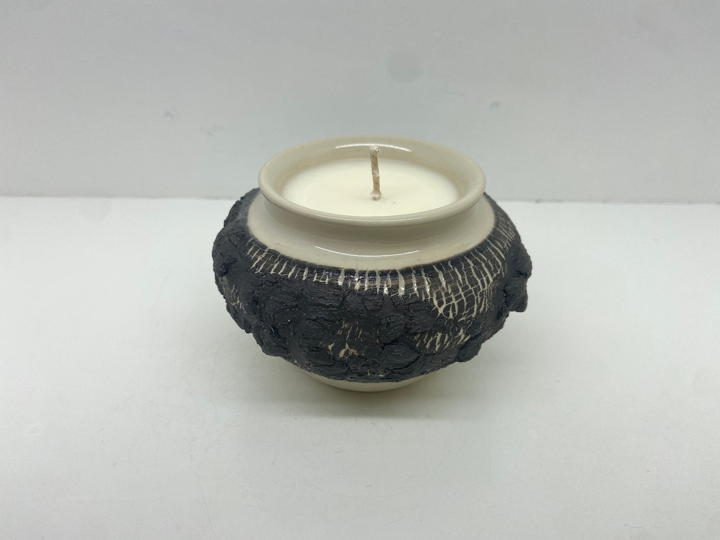 Tree-bark inspired patchouli candle