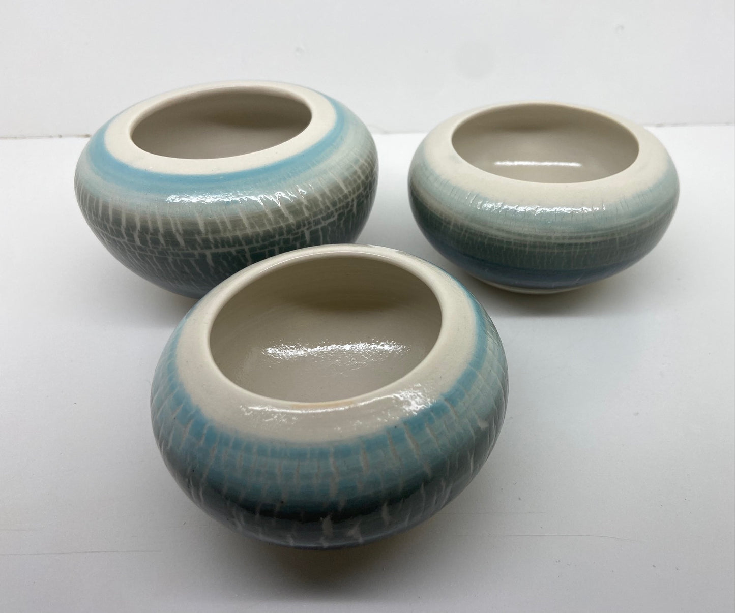 Set of three green ocean themed candles