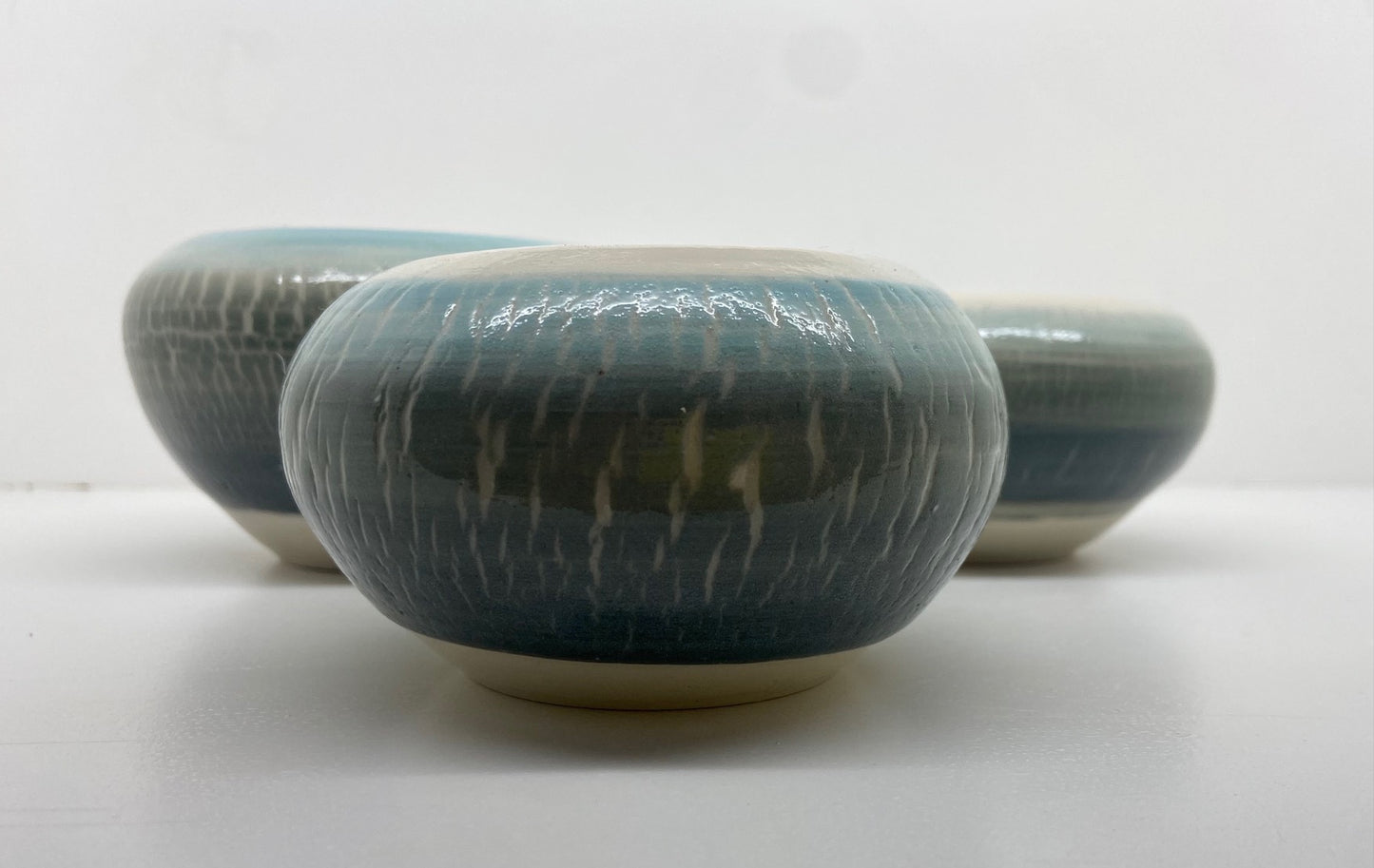 Set of three green ocean themed candles