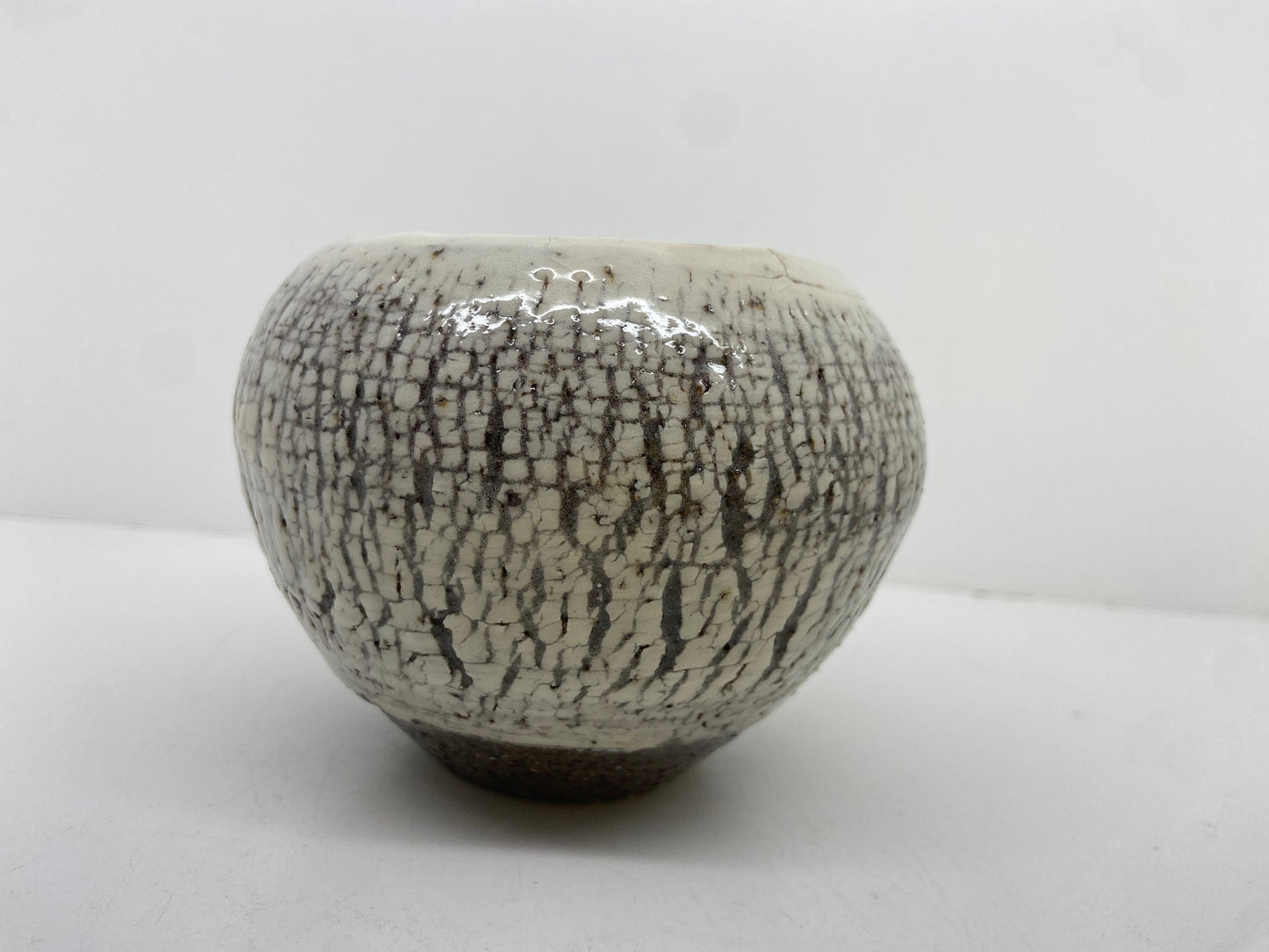 Rough vessel with porcelain slip