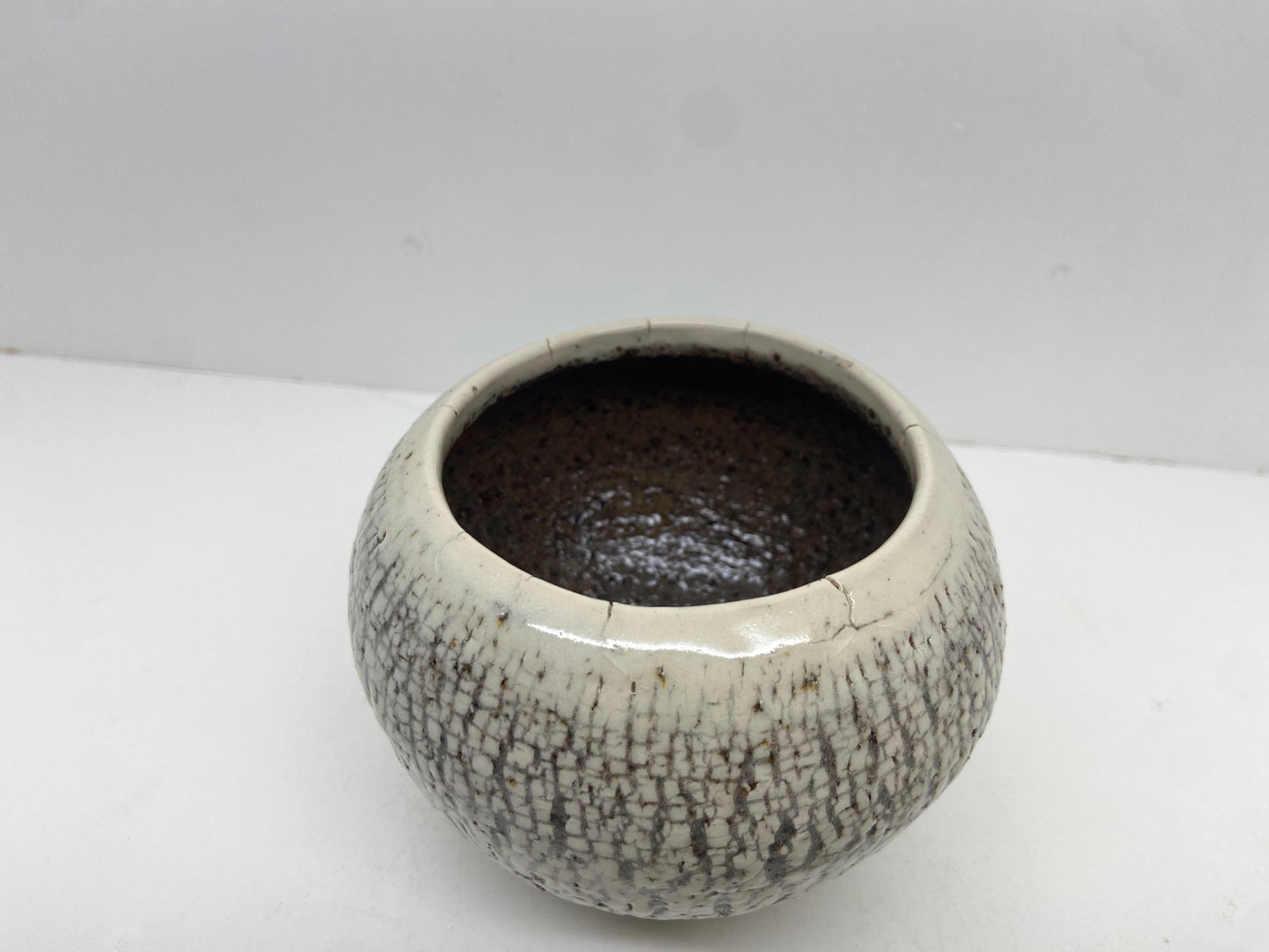Rough vessel with porcelain slip