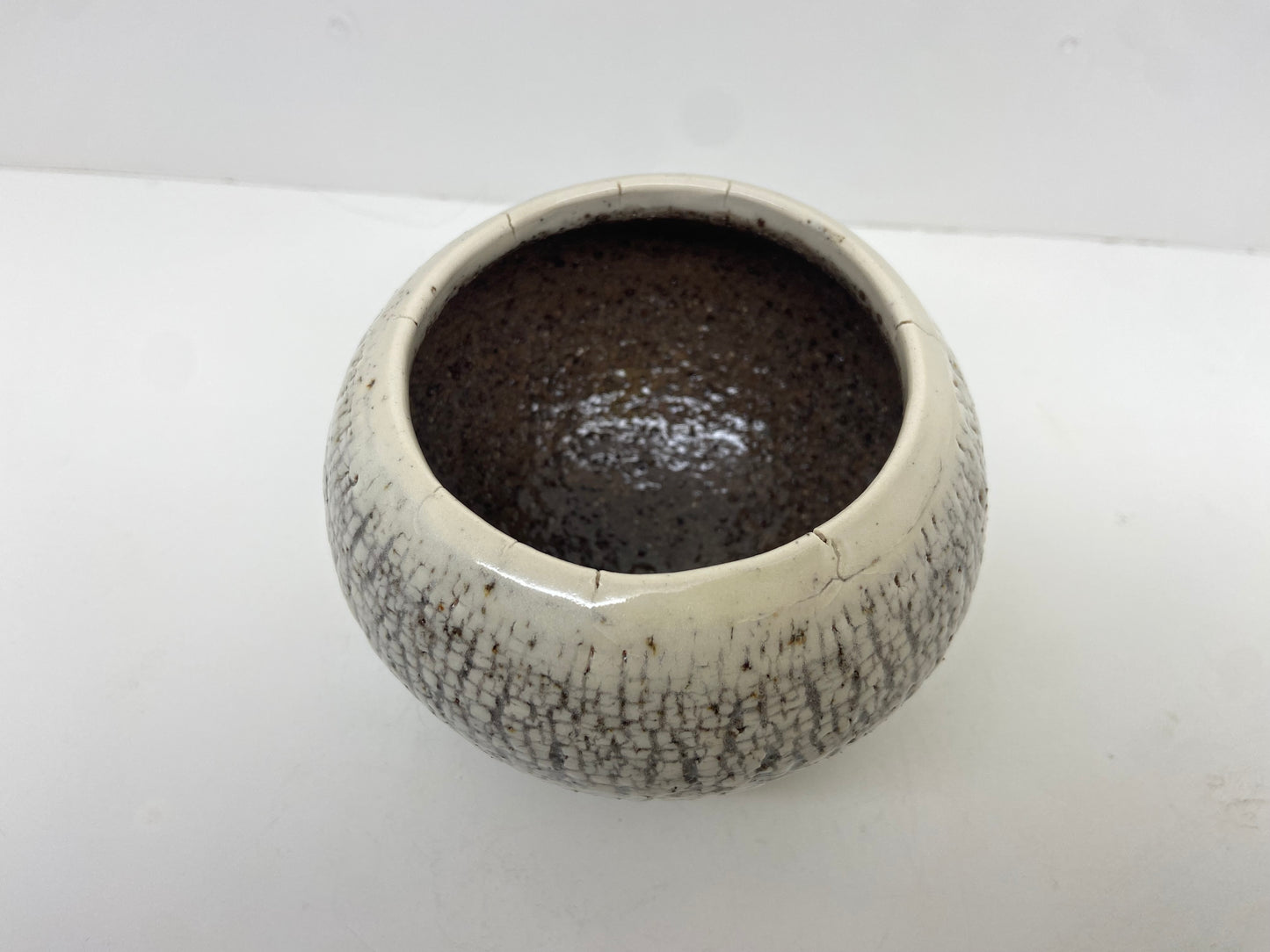 Rough vessel with porcelain slip